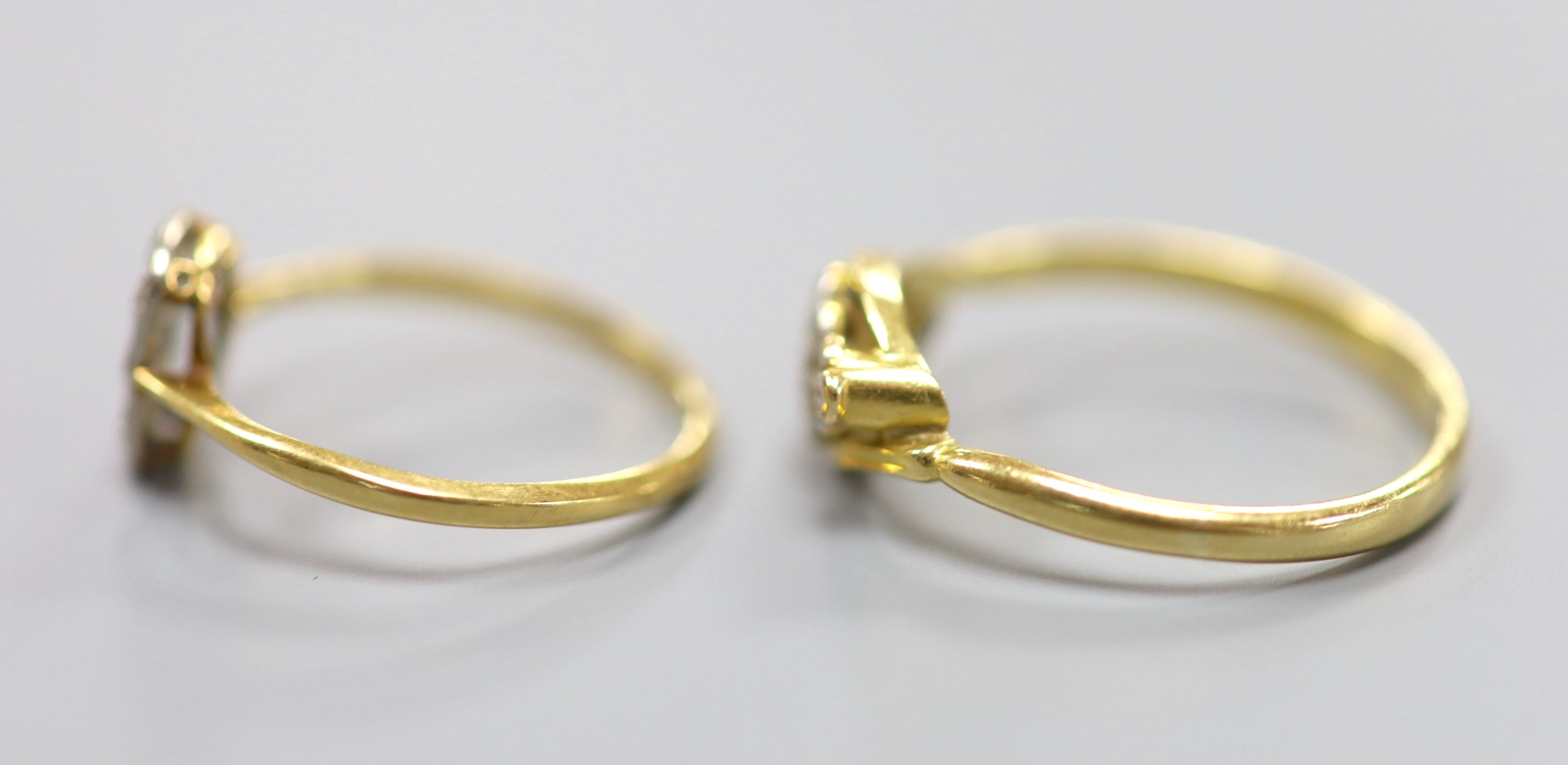 Two diamond set rings